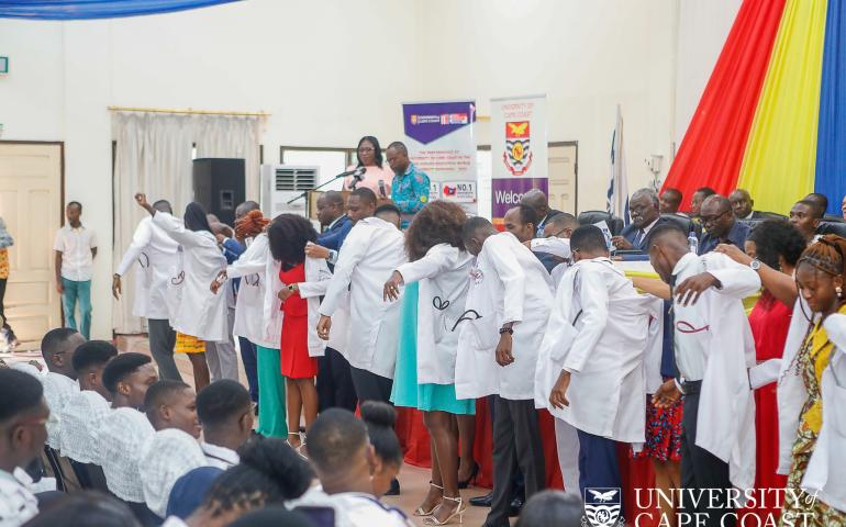 Some medical students clad in their white coats
